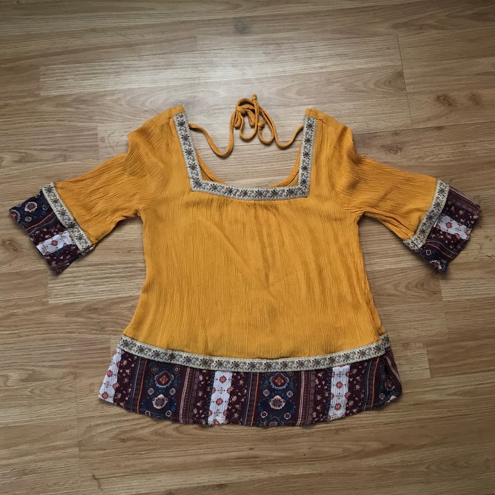 Yellow three quarter sleeved shirt
